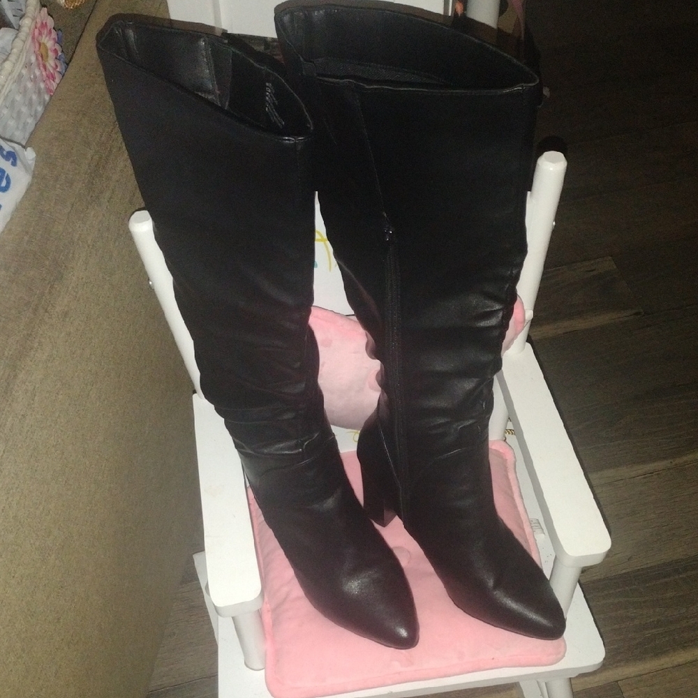 Sleek Black Over the Knee Wide Calf Boots..  The Calf Is 9 Inches Wide.